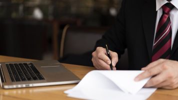man-office-writing-paper